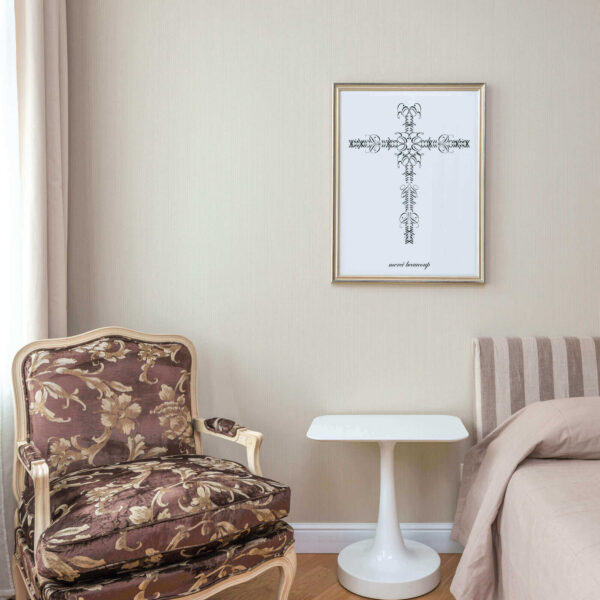 room with chair and cross on wall above table with
