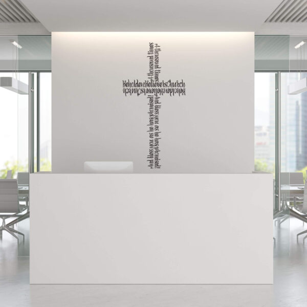 all white Interior reception desk featuring a branded organization name cross