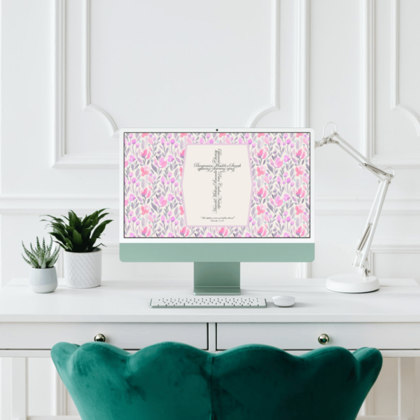 Desk with computer showing Digital floral wallpaper featuring a personalized Name Cross in the center