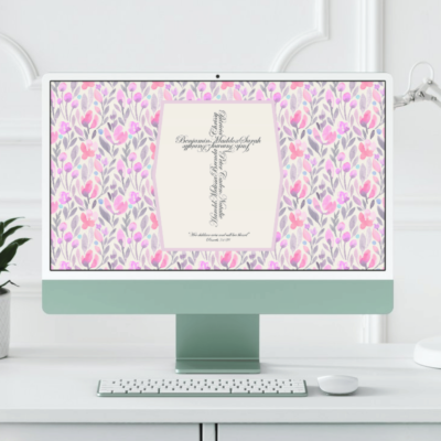 Image of computer showing floral pattern wallpaper with a Name Cross in the center