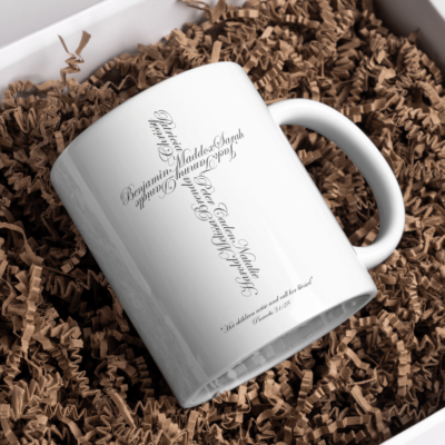 Coffee mug featuring a customized name cross in the center